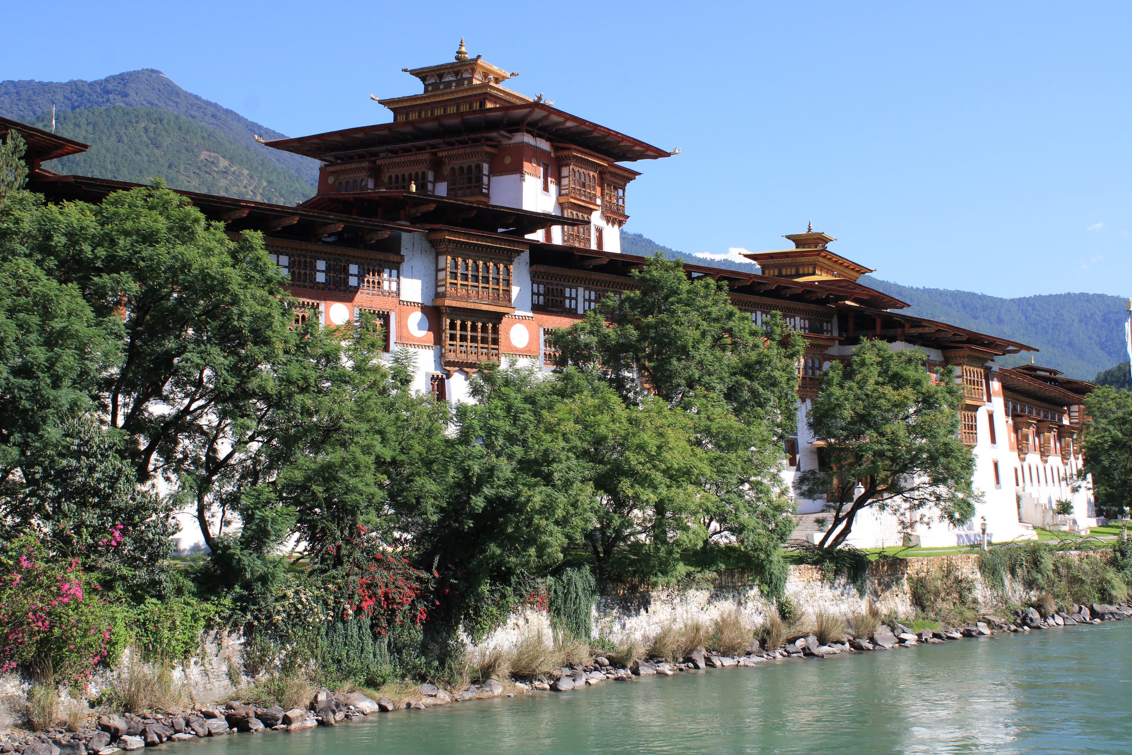 A dzong fortress overlooking a Bhutanese valley